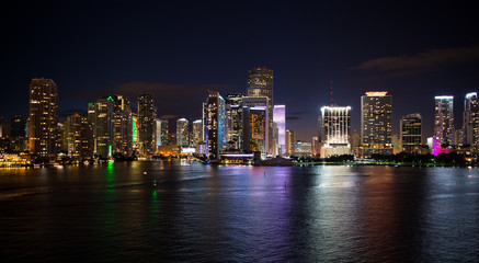 Fototapeta na wymiar Miami skyscrapers skyline at night, Aerial view