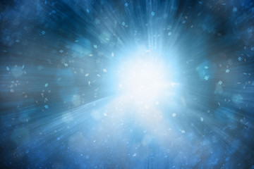 Bright shiny blue color snowy bokeh with light rays background. Abstract blurred Christmas and New...
