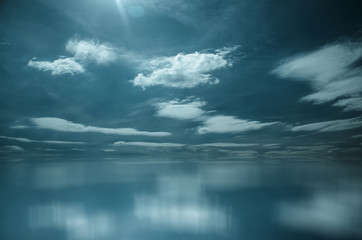 White Clouds over Blue Sea