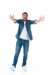 excited man with straighten hands while looking at camera isolated on white