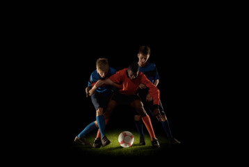 Footballers competing for ball