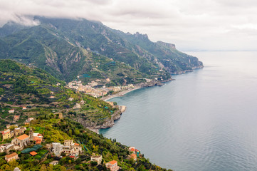 View of the Amalfi Coast from the garden of Villa Rufolo on a cloudy and rainy autumn day -  Ravello, Campania, Italy