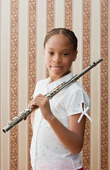 Girl with flute © Image Source RF
