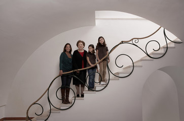 Three generation family on staircase