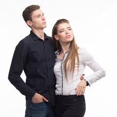 Young pensive couple portrait of a confident businessmanon a gray background. Ideal for banners, registration forms, presentation, landings, presenting concept.