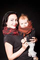 Portrait of a mother and a little boy punks rock