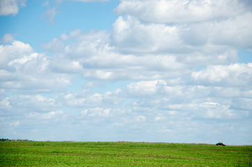 tractor on the horizon line