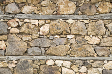 Old colorful stone wall closeup