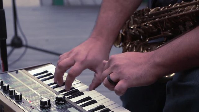 Keyboard Musician Plays