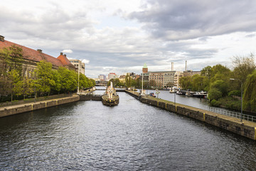 Fototapeta na wymiar Dikes on the Spree river in Berlin, Germany