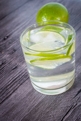 Fresh cold water with lime in a glass