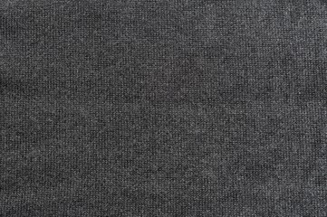 Fototapeta na wymiar Close up of dark grey jersey fabric