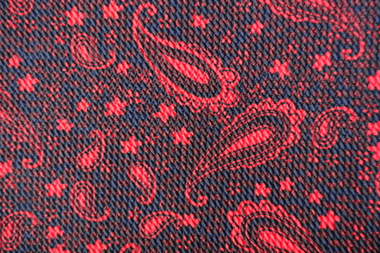 Red and black fabric with paisley pattern