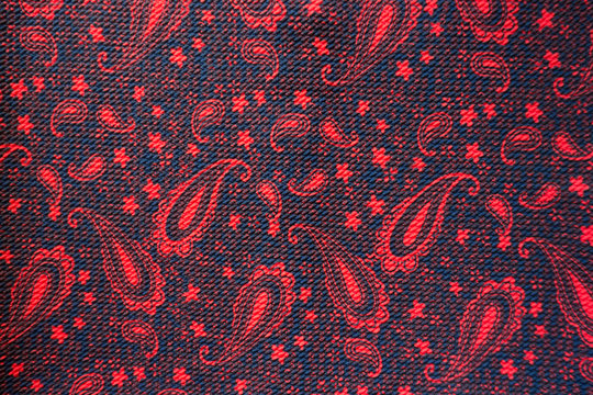 Fabric with Paisley pattern in red and black