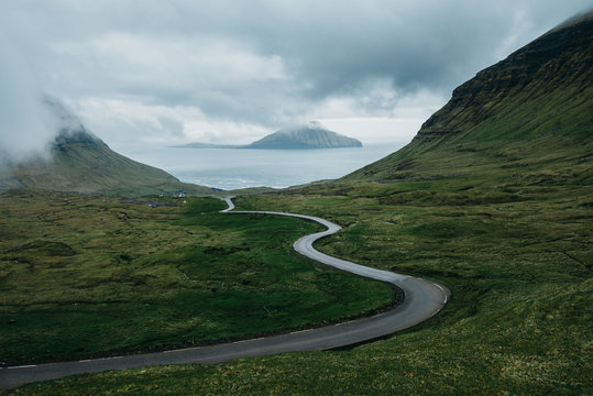 Windy road through mythical landscape
