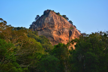 View of the Sigiriya Rock from the jungle at sunset, Sri Lanka