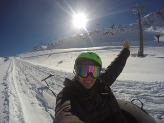 Girl taking a selfie on fun Sports on Snow in Farellones, Chile