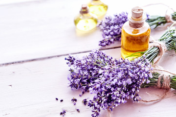 Fototapeta na wymiar Spa background with lavender and essential oil