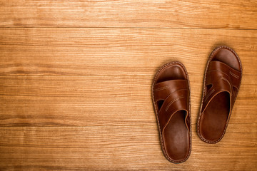 Slippers on a wooden table
