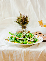 Green salad with arugula and baked chickpeas.Healthy detox meal concept. Copy space.
