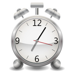 Metal mechanical realistic alarm clock, a clock showing five minutes after seven, end of the day, early morning