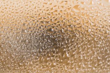 Drops on glass. Texture. Light background