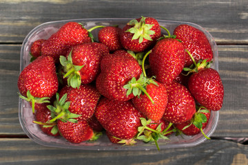 Strawberry. Wooden background. Summer fruit. Healthy food