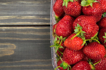 Strawberry. Wooden background. Summer fruit. Healthy food