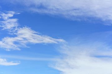 Obraz premium Beautiful white clouds and blue sky background