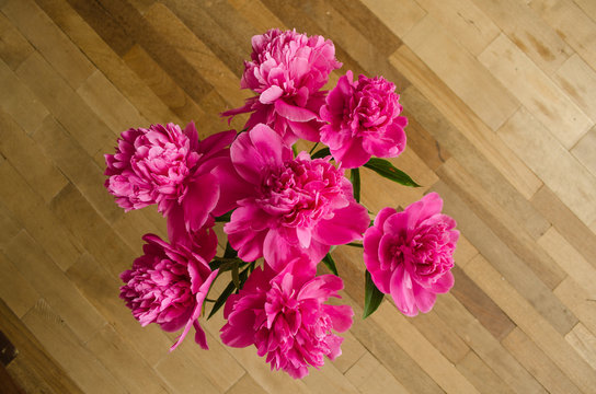 Bunch of peonies flowers on the floor