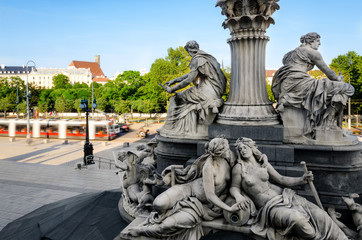 Fototapeta na wymiar Vienna seen from the Austrian Parliament Building, with a detail of the parliament monumental fountain
