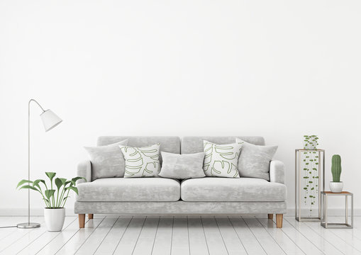 Livingroom interior wall mock up with gray fabric sofa and pillows on white wall background with free space on top. 3d rendering.
