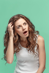 Fototapeta premium Portrait of young woman with shocked facial expression