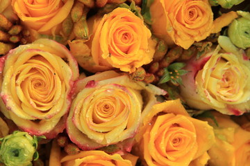 Mixed yellow bridal roses