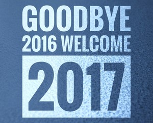 Goodbye 2016 welcome 2017 words on abstract blue background.
