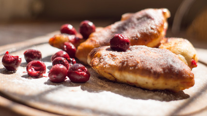 Tasty pies with sweet cherry © Lidia