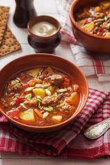 Lentil soup with meat-balls and cream sauce