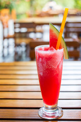 Smoothies iced water melon juice in a glass close up.