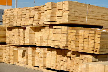 Wooden planks on timber yard, warehouse or sawmill.