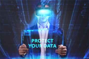 Business, Technology, Internet and network concept. Young businessman working in virtual reality glasses sees the inscription: Protect your data