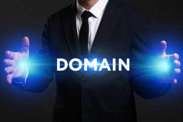 Business, Technology, Internet and network concept. Young businessman working on a virtual screen of the future and sees the inscription: Domain