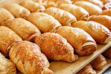 Puff pastry on wooden board. morning at the bakery