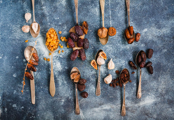Food in spoons Variety Of Dry Fruit Displayed chocolate bonbon