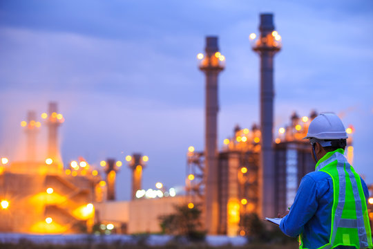 oil refinery plant at sunrise with sky background,blur,bokeh