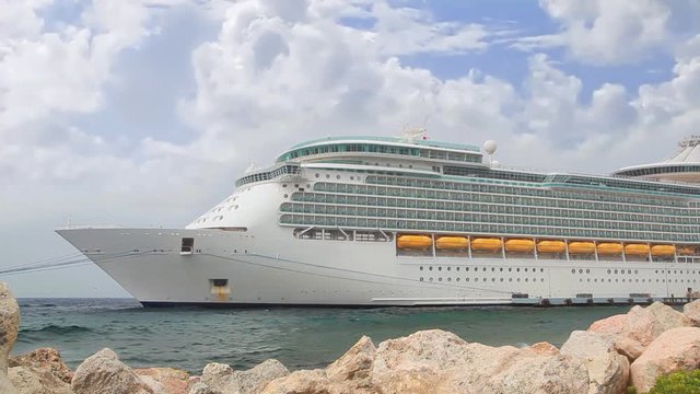 Luxury Cruise Ship in Port on sunny day