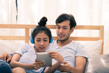 Young couple with headphones