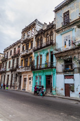 Fototapeta na wymiar HAVANA, CUBA - FEB 22, 2016: Life on a street in Old Havana.