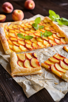 Delicious Puff Pastry Pie Topped With Sliced Peach