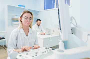 Obraz premium Young Scientists working at chemisty laboratory