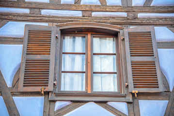 Deatil of a traditional alsatian window in Colmar, France